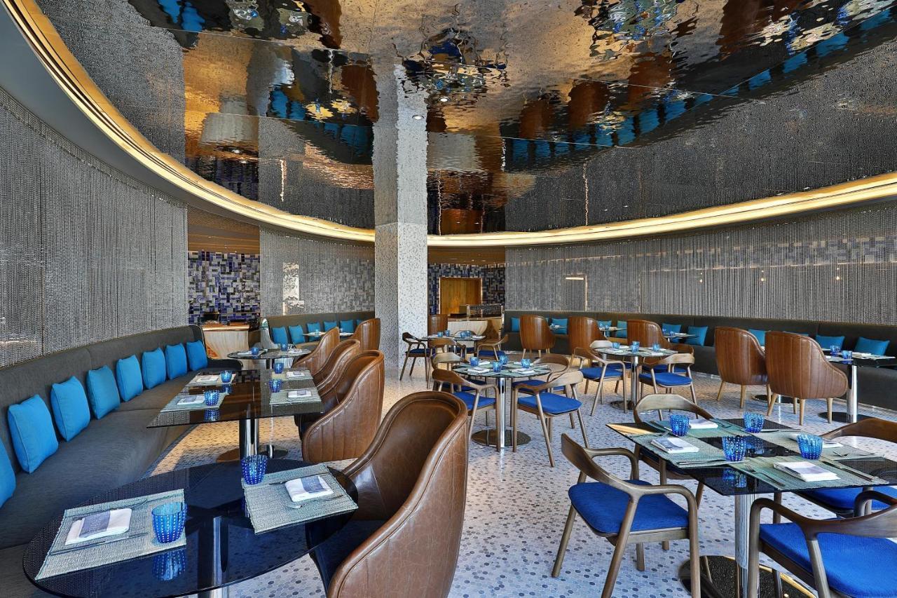 ดับเบิลยู มัสกัต Hotel ภายนอก รูปภาพ The interior of the restaurant