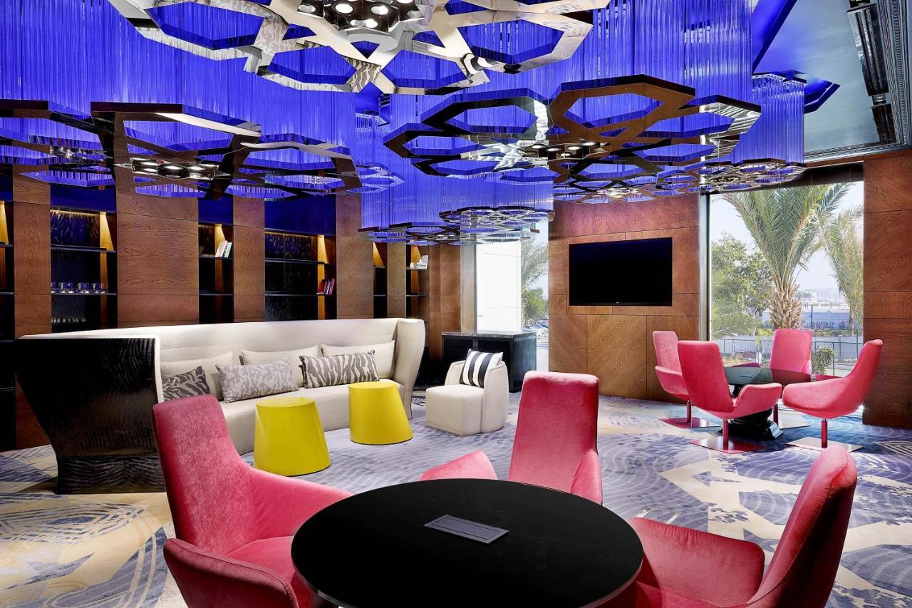 ดับเบิลยู มัสกัต Hotel ภายนอก รูปภาพ The W lounge at Beijing Capital International Airport